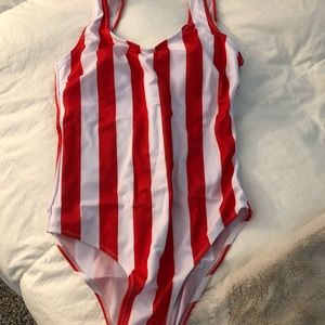 Red and white striped one piece suit